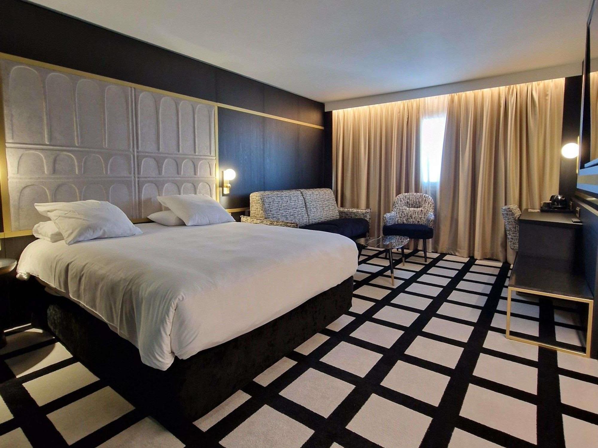 Deluxe Kamer met Tweepersoonsbed en Tweepersoonsslaapbank